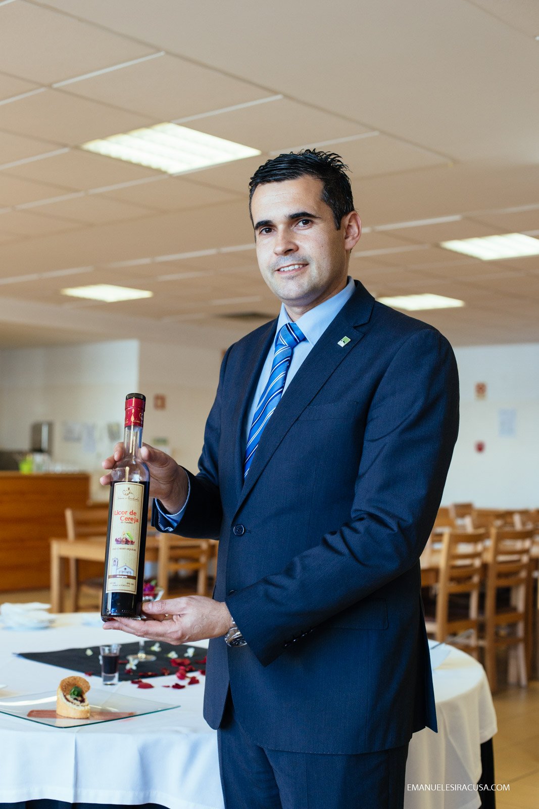 José Carlos Gil Graça, a teacher at the professional school in Fundao, holds a bottle of locally produced Cherry Liquor, Fundao, 2016